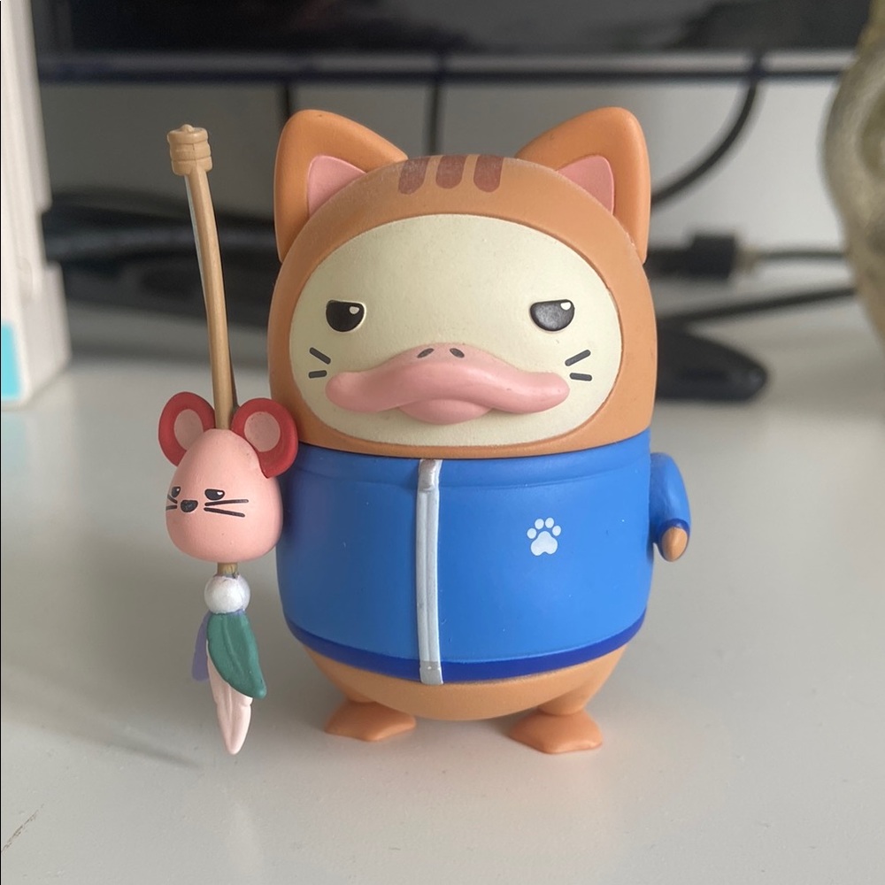 Blue and Brown Duckoo Figurine with Mouse Accessory (POP MART)